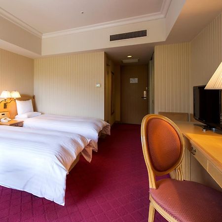 Hotel Okura JR Huis Ten Bosch Sasebo Exterior foto A room at the hotel
